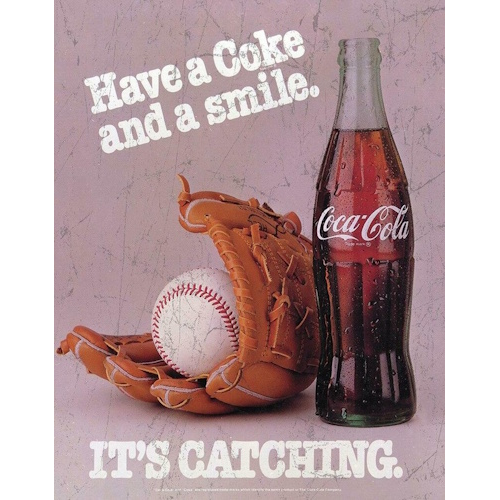 Plaque coca cola have a coke and a smile